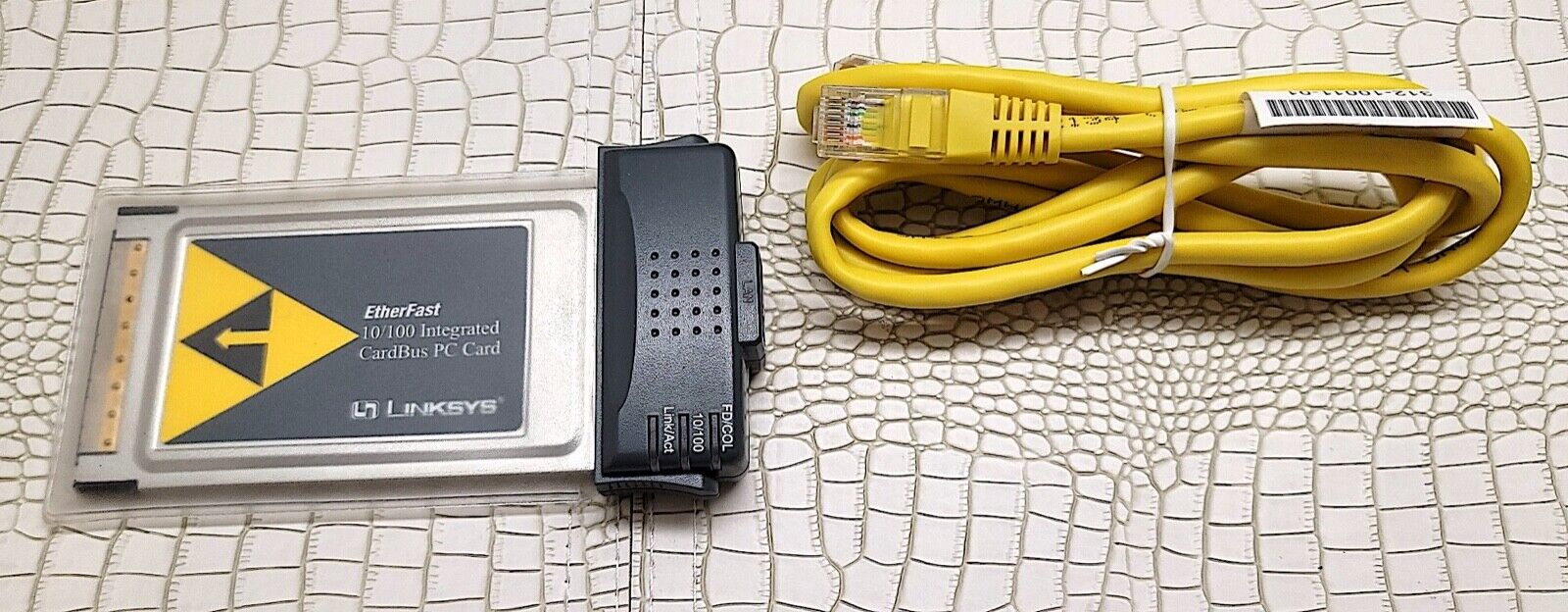 Unused Linksys PCM200 EtherFast Cardbus10/100 32-Bit Network Card with cable