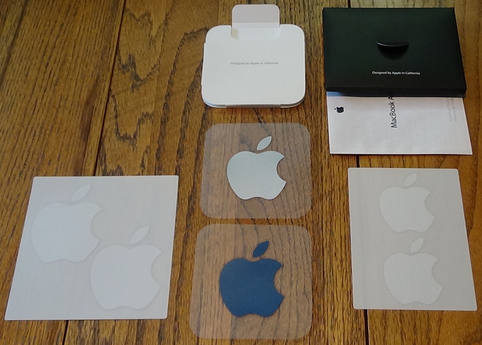 Apple Logo Stickers from three different Macs