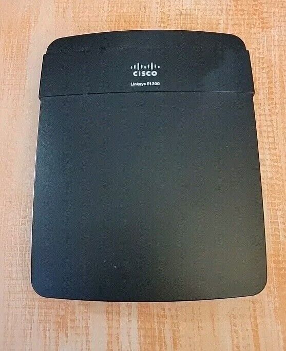 Linksys E1200 300 Mbps 4-Port  Wireless N Router -- No Pwr Adapter --