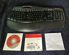 Microsoft Wireless Natural Multimedia Keyboard & Installation Disc. picture