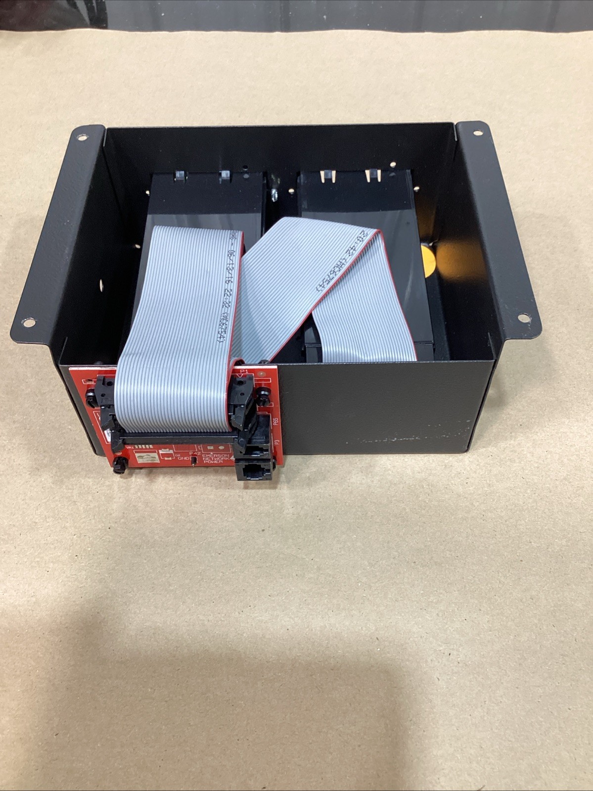 Vertiv IS-UNITY-DP Communications Card 417831G inside of an Emerson Intellislot