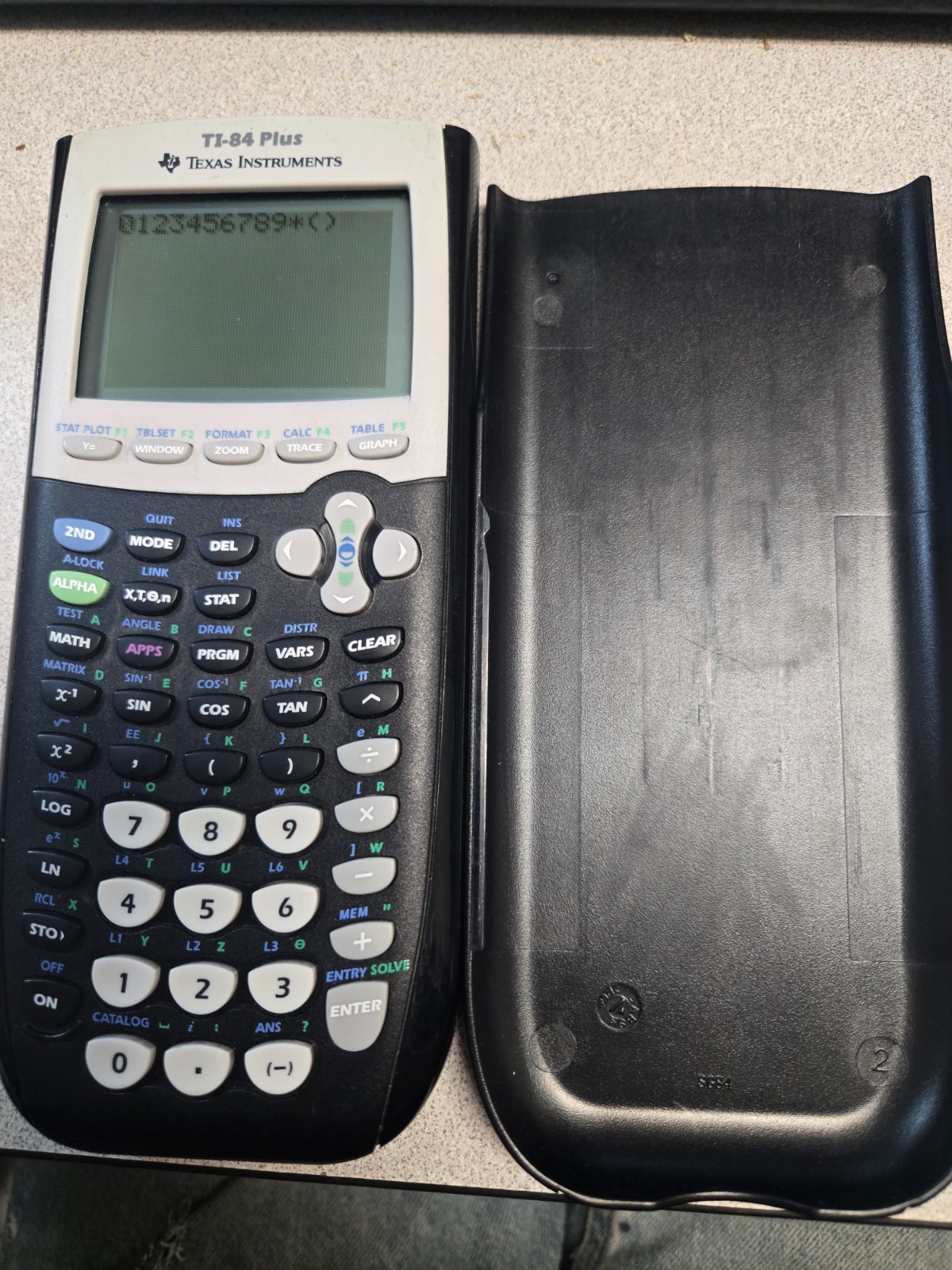 Texas Instruments TI-84 Plus Graphing Calculator *HAS ENGRAVINGS*