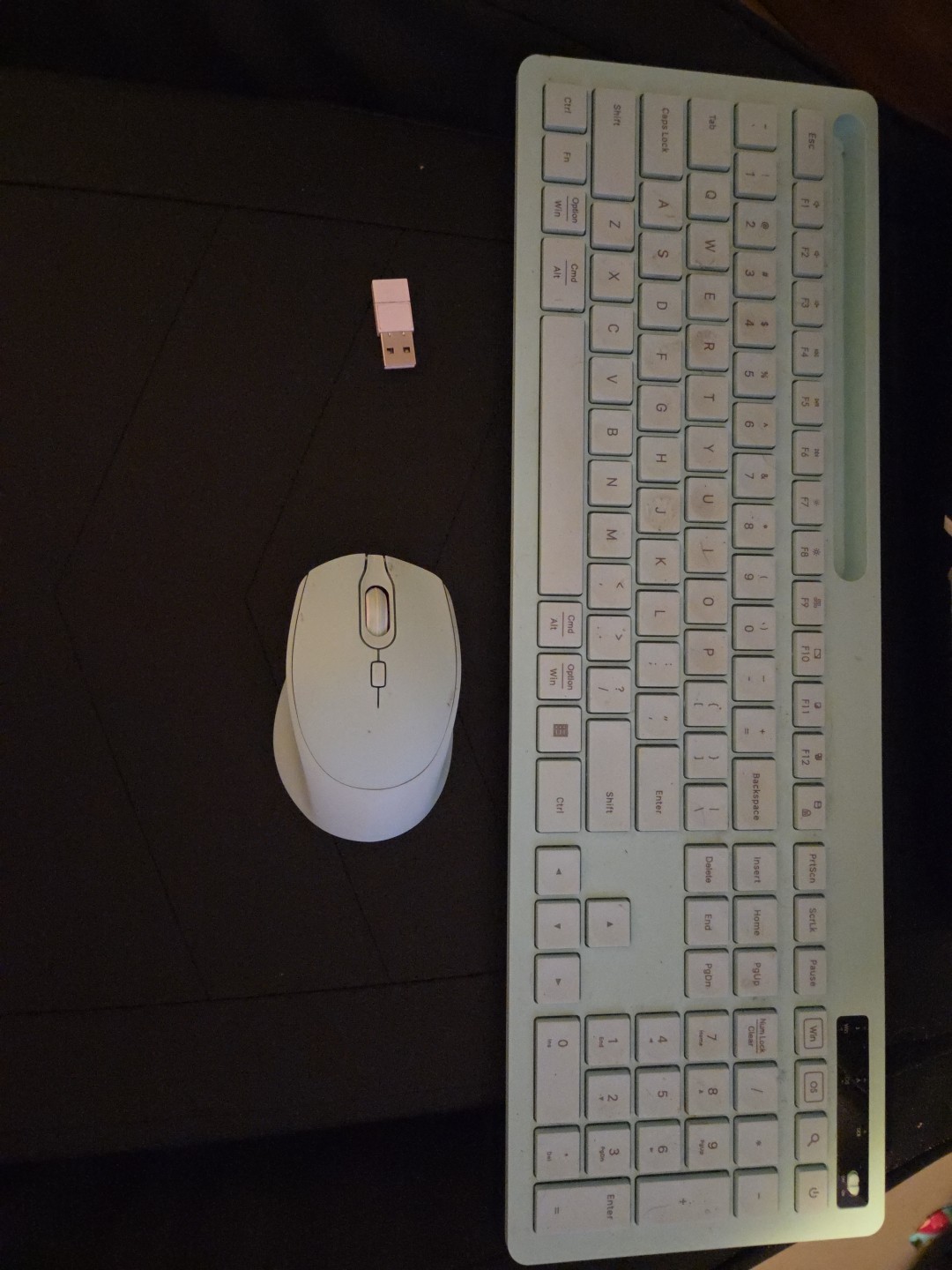 A Light Blue Keyboard An Mouse