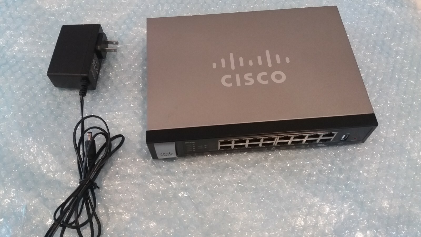 Cisco RV325 Dual Gigabit Router with power supply. 