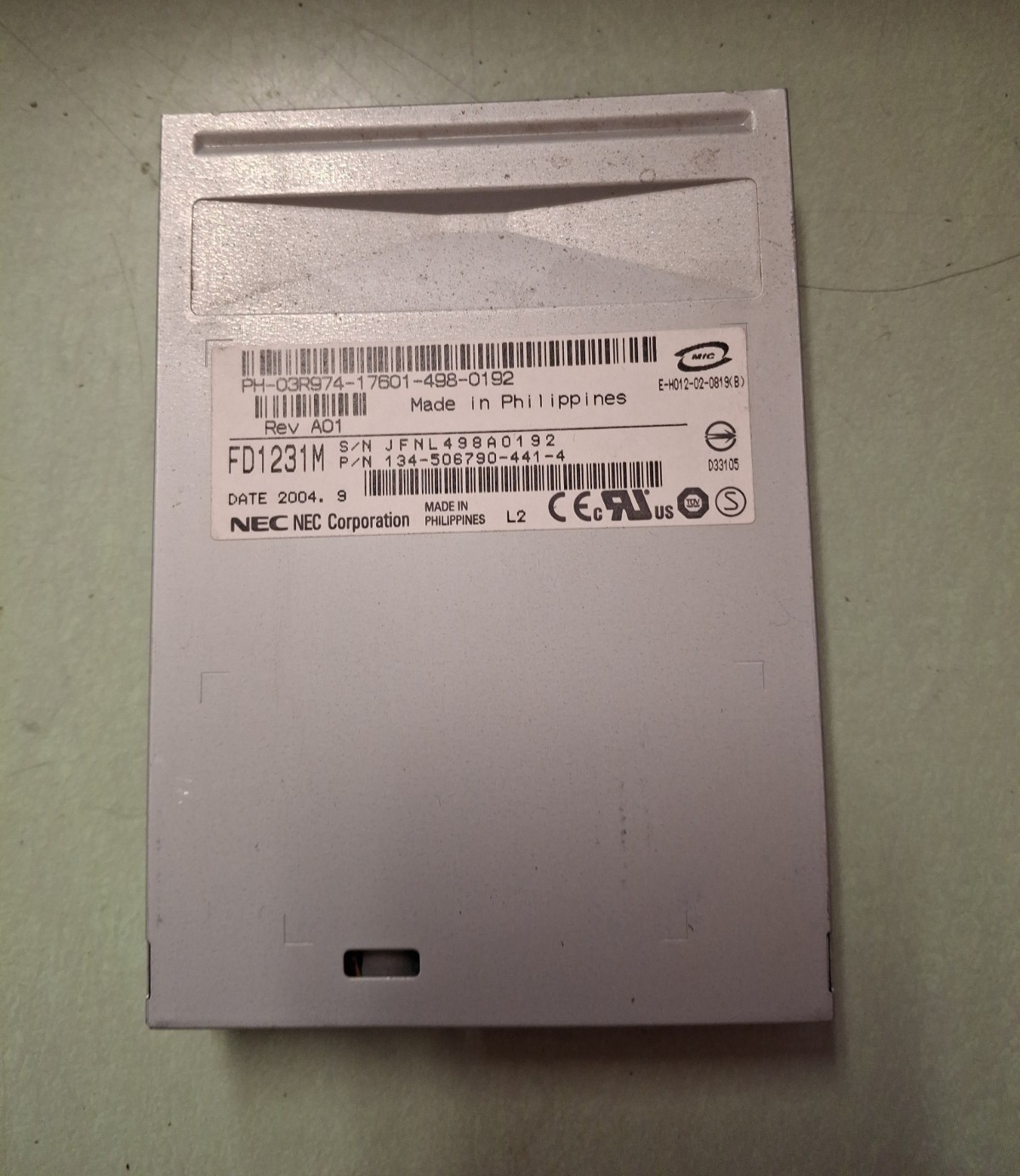 NEC FD1231M 134-506790-441-4 FLOPPY DRIVE - BLACK BEZEL NO FACE PLATE