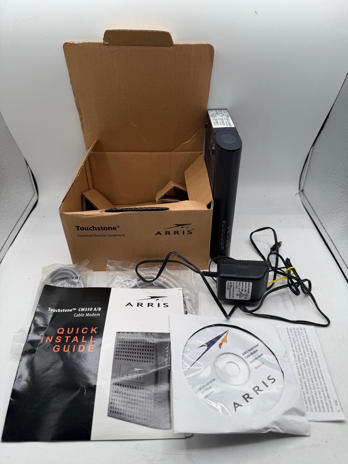 ARRIS Touchstone CM550A Cable Modem Complete Box Cords Manual CD Tested Works