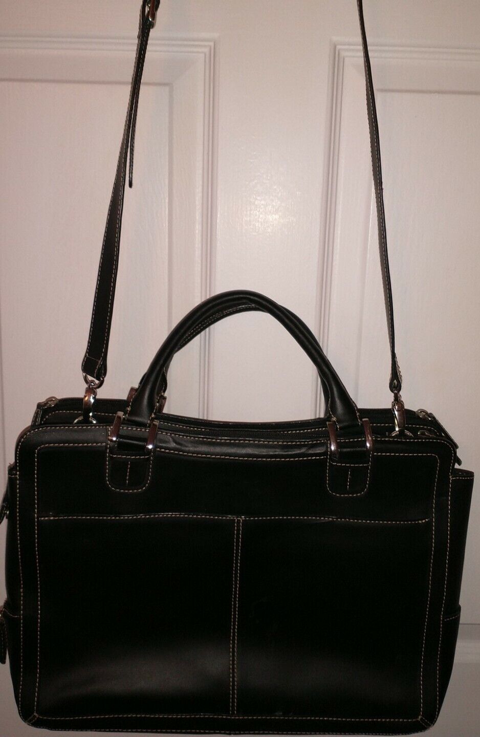 Leather briefcase  heavy leather by  Franklin Covey.  Will hold a tablet .