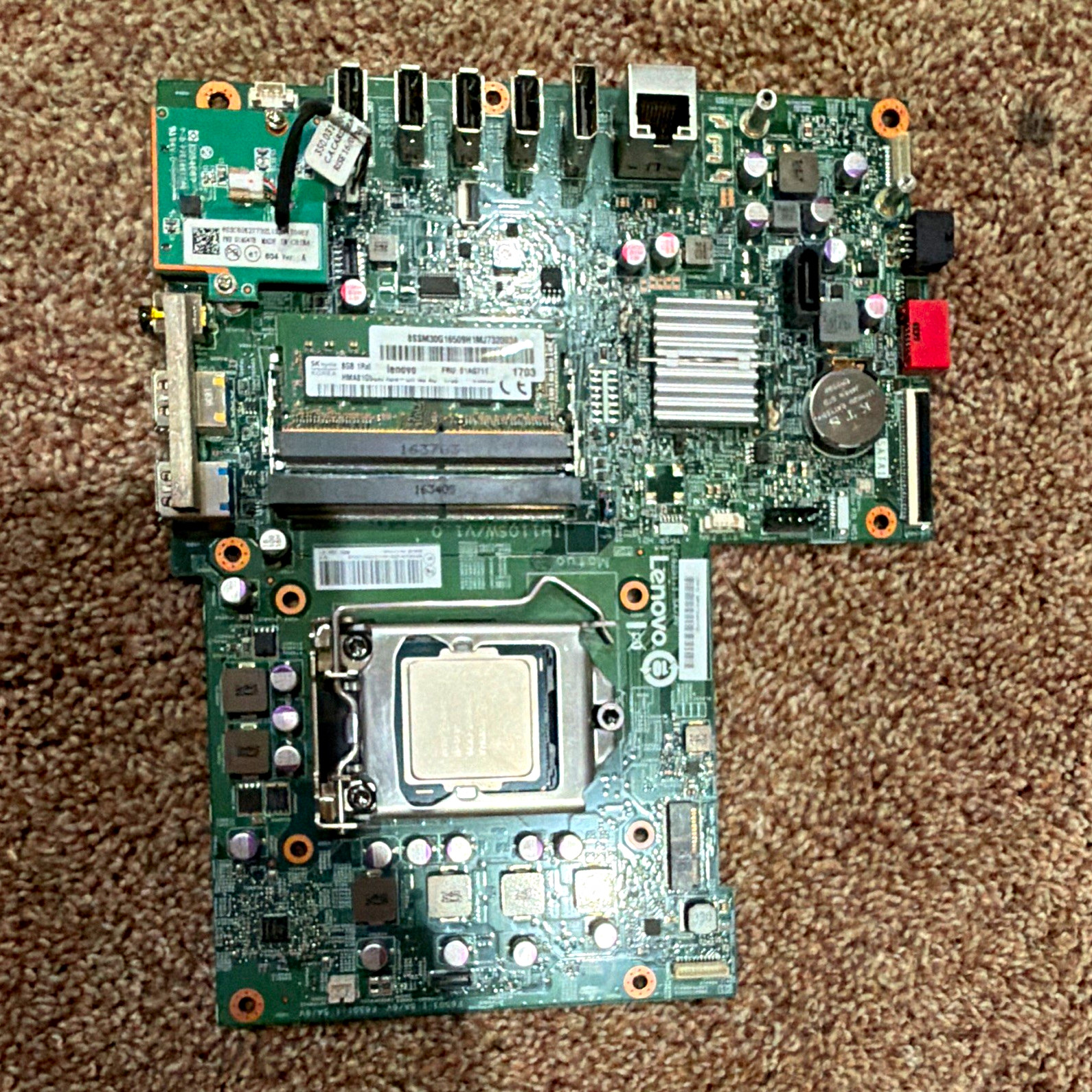 Lenovo m800z aio working motherboard includes wifi card, ram, and processor.