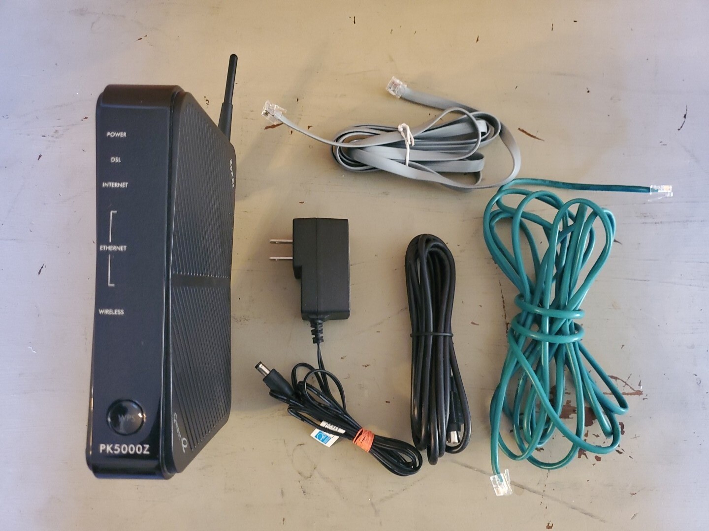 ZYXEL Qwest CenuryLink PK5000Z - ADSL2+, 2.4GHz b/g, Wireless 802.11 b/g/n Modem