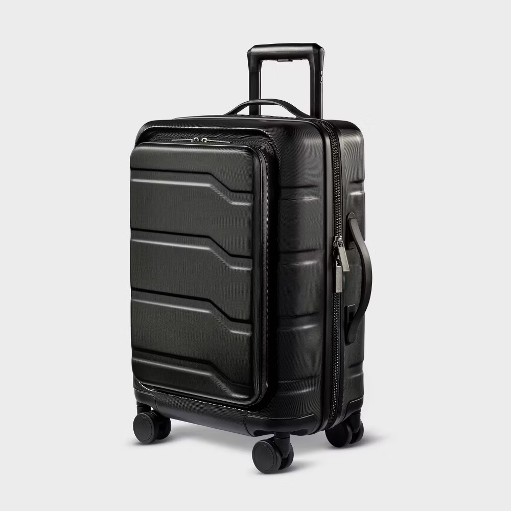Hardside Carry On Spinner Suitcase with Front Pocket - Open Story Black