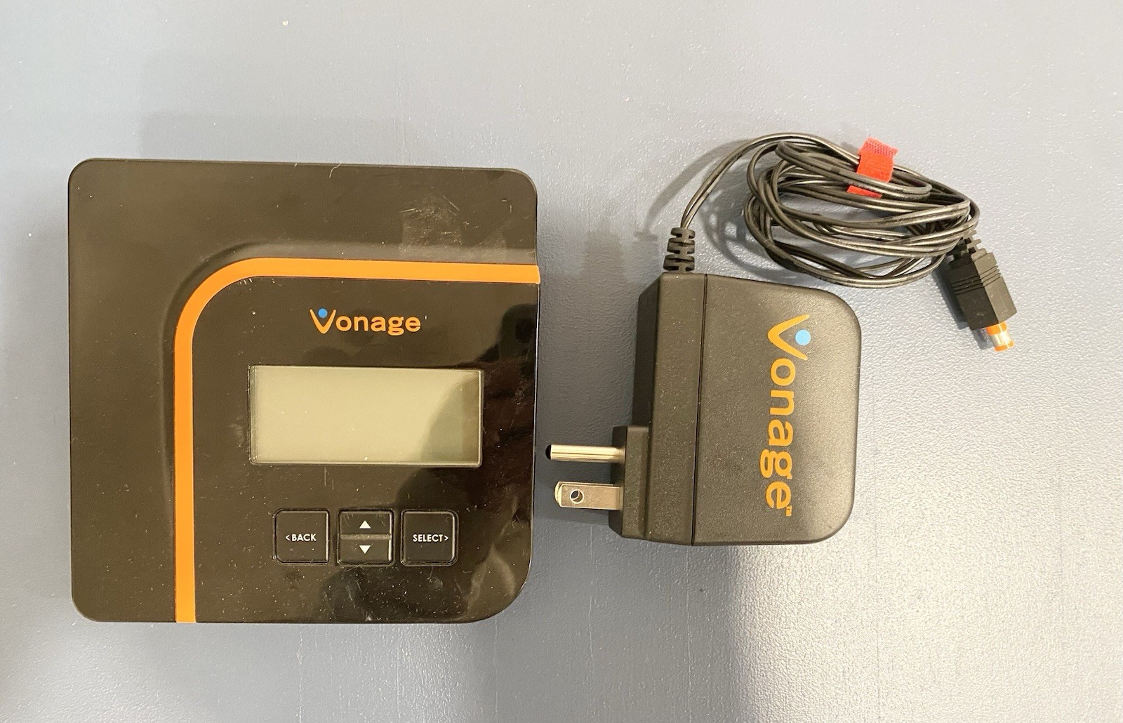 Portal (VDV21-VD) VoIP digital phone adapter with a power cord