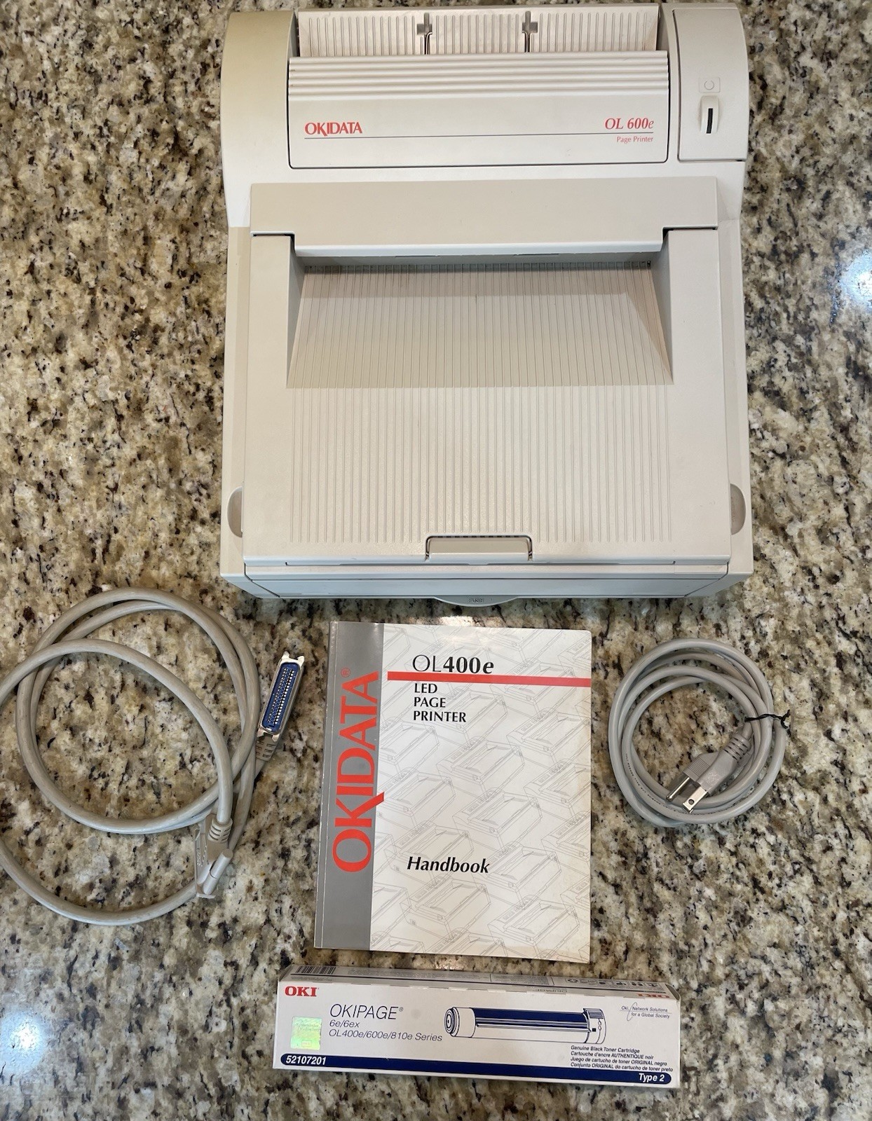 Okidata OL 600e Page Printer With Cords, Handbook, Extra Cartridge & Box