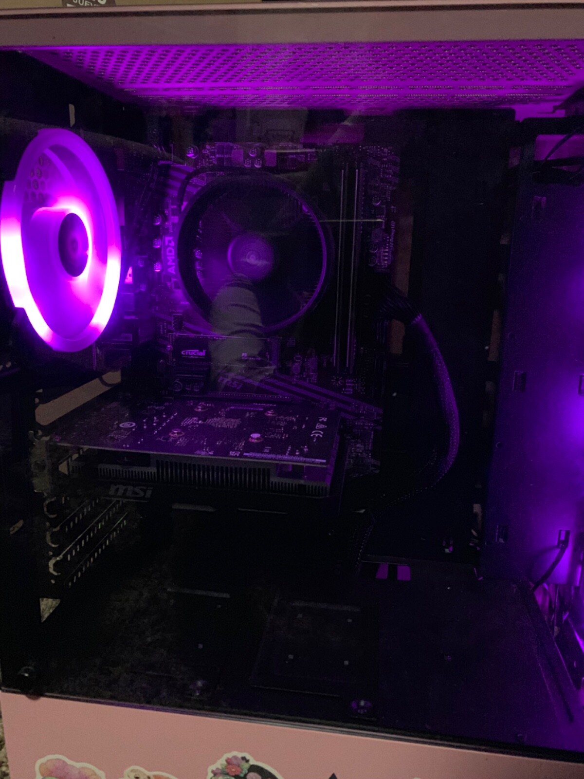 Pink PC build with rotating monitor and wired LED keyboard and mouse 