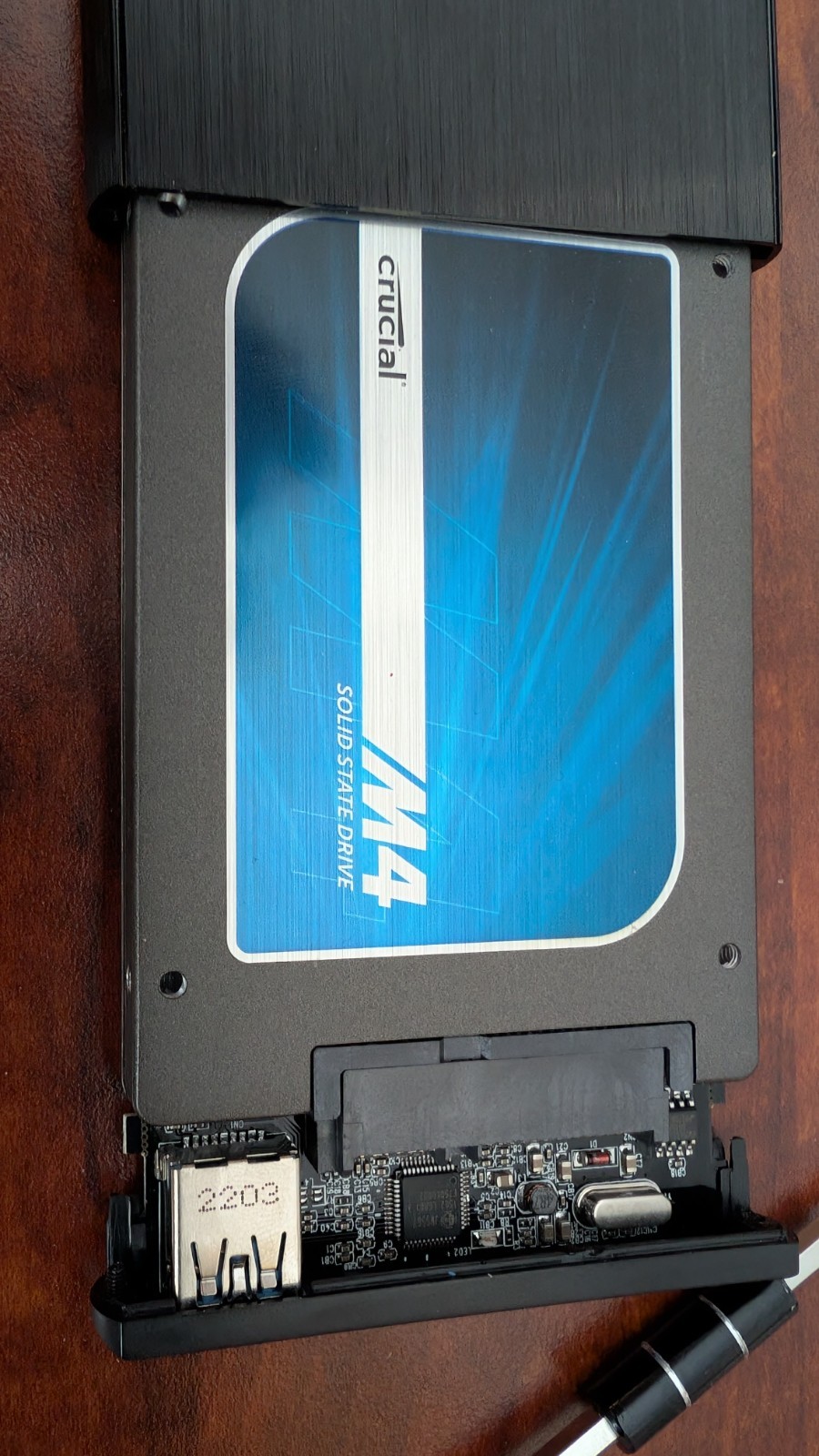 Crucial M4 128GB SSD in Sabrent enclosure with Case Logic carrying case