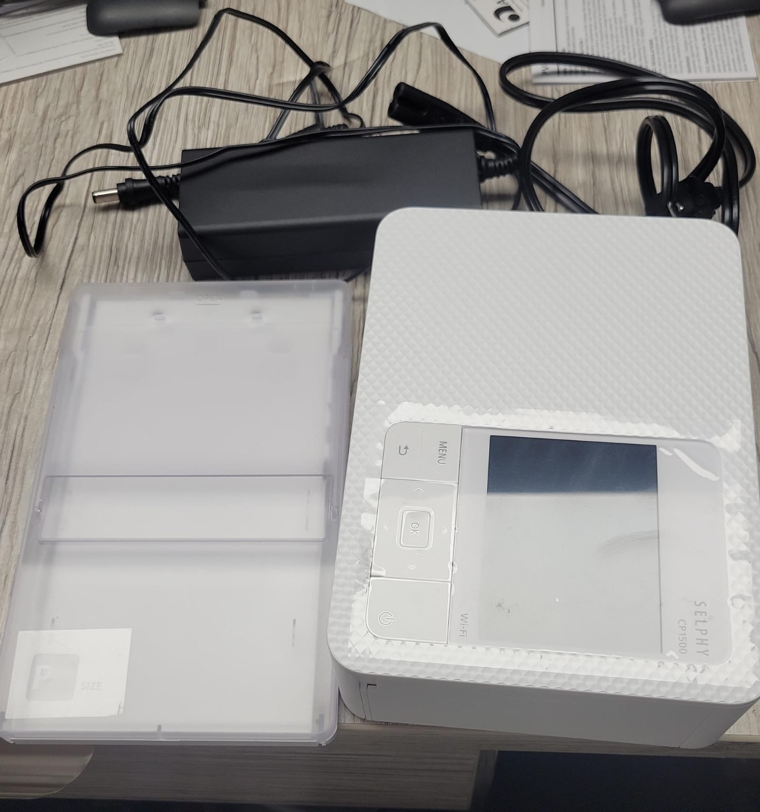 Canon Selphy CP1500 Wireless Compact Photo Printer (white) The screen has a lot