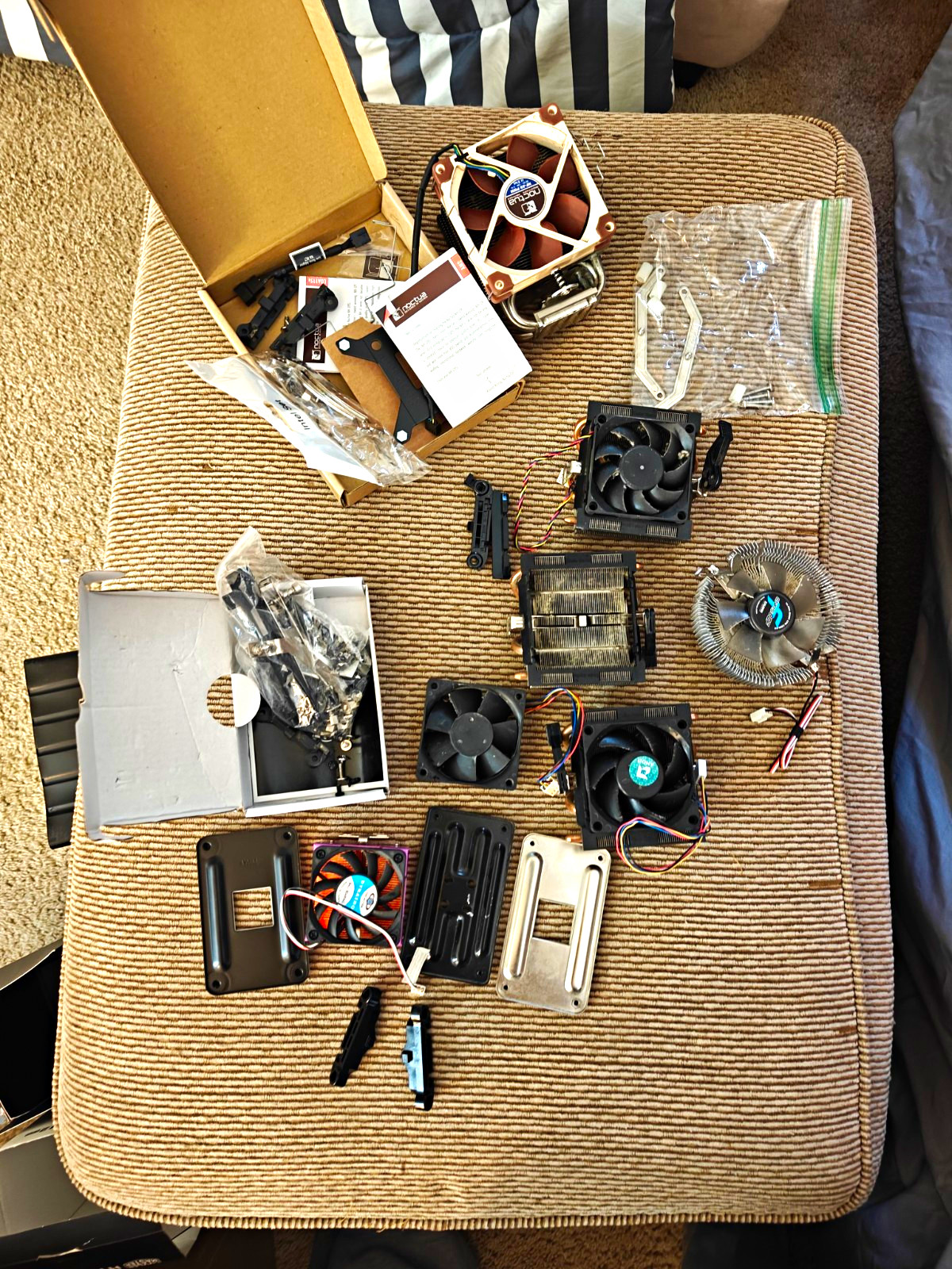 Lot Of CPU Cooler Heatsinks, Fans, And Mounting Hardware