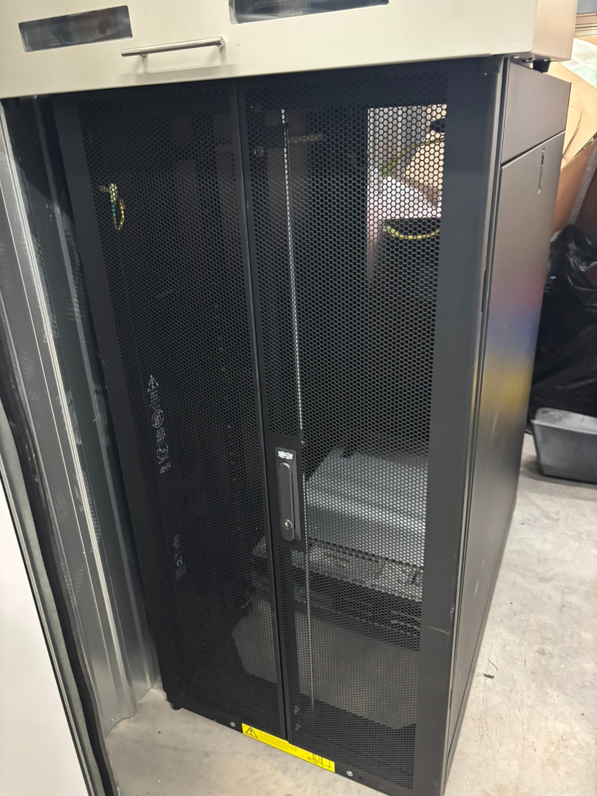 Tripp-Lite 25U Rack w/Locking Sides & Front Doors and Wheel Casters