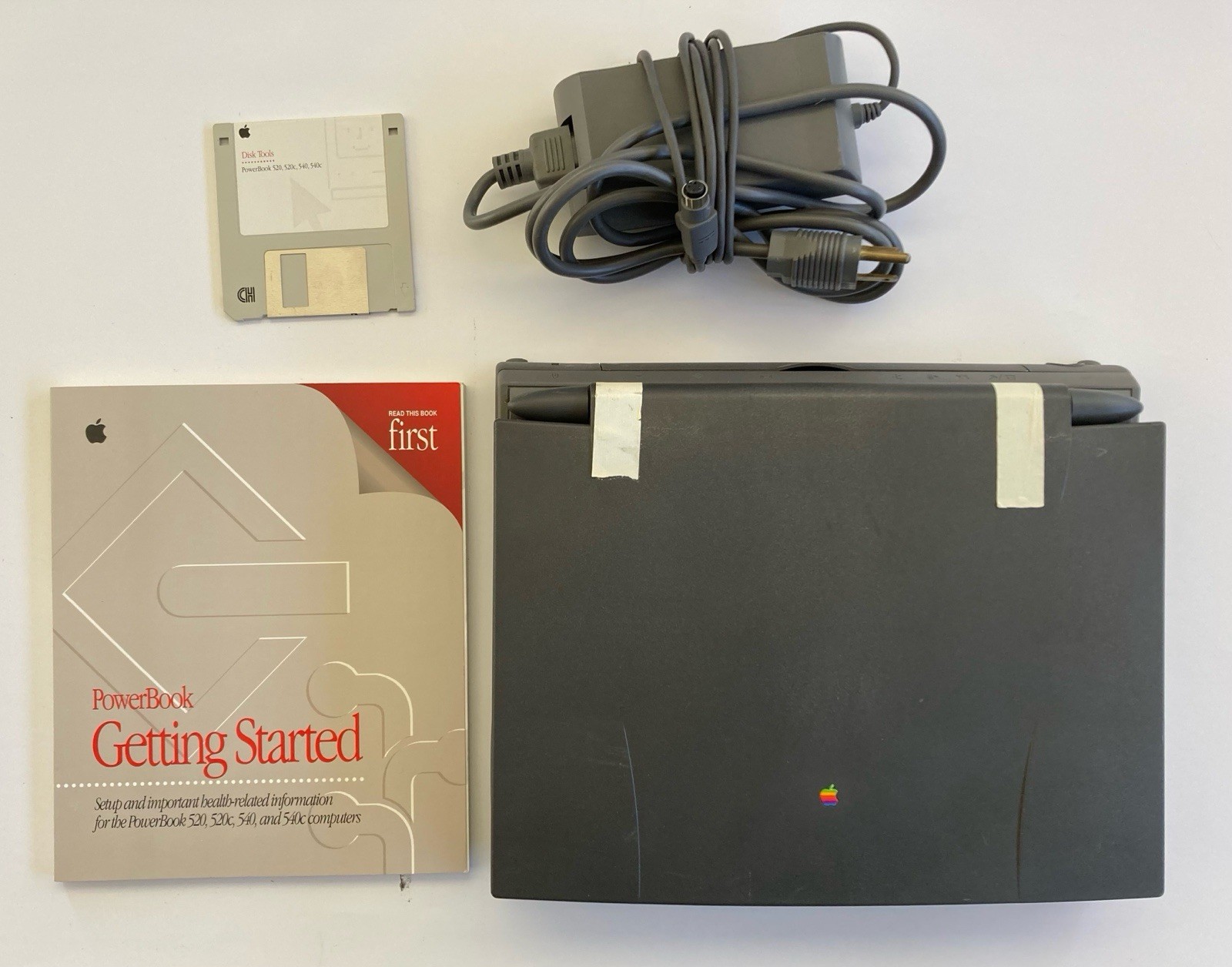 Apple PowerBook 540c w/battery, drive, power supply, Manual