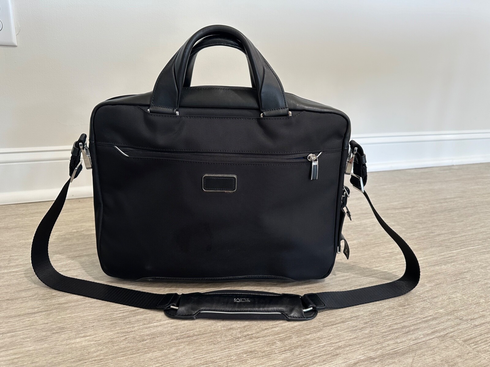 Tumi 'Arrive' black leather trimmed Sawyer briefcase