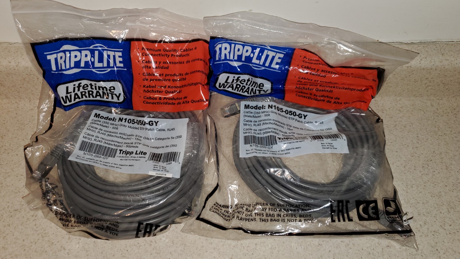 TRIPP-LITE N105-050-GY Cat5e 50ft Cable Male to Male Sealed Bag Ship FAST FREE