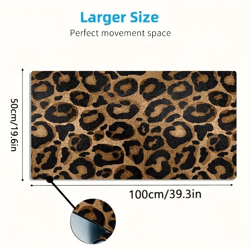 A Large Gaming Mouse Pad Featuring a Golden And Black Leopard Print Design, wi