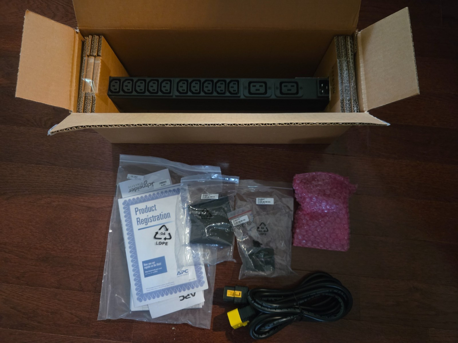 NIB-APC AP9559 NetShelter Rack Mount PDU 16A 208 & 230V, 10 C13 & 2 C19 Outlets