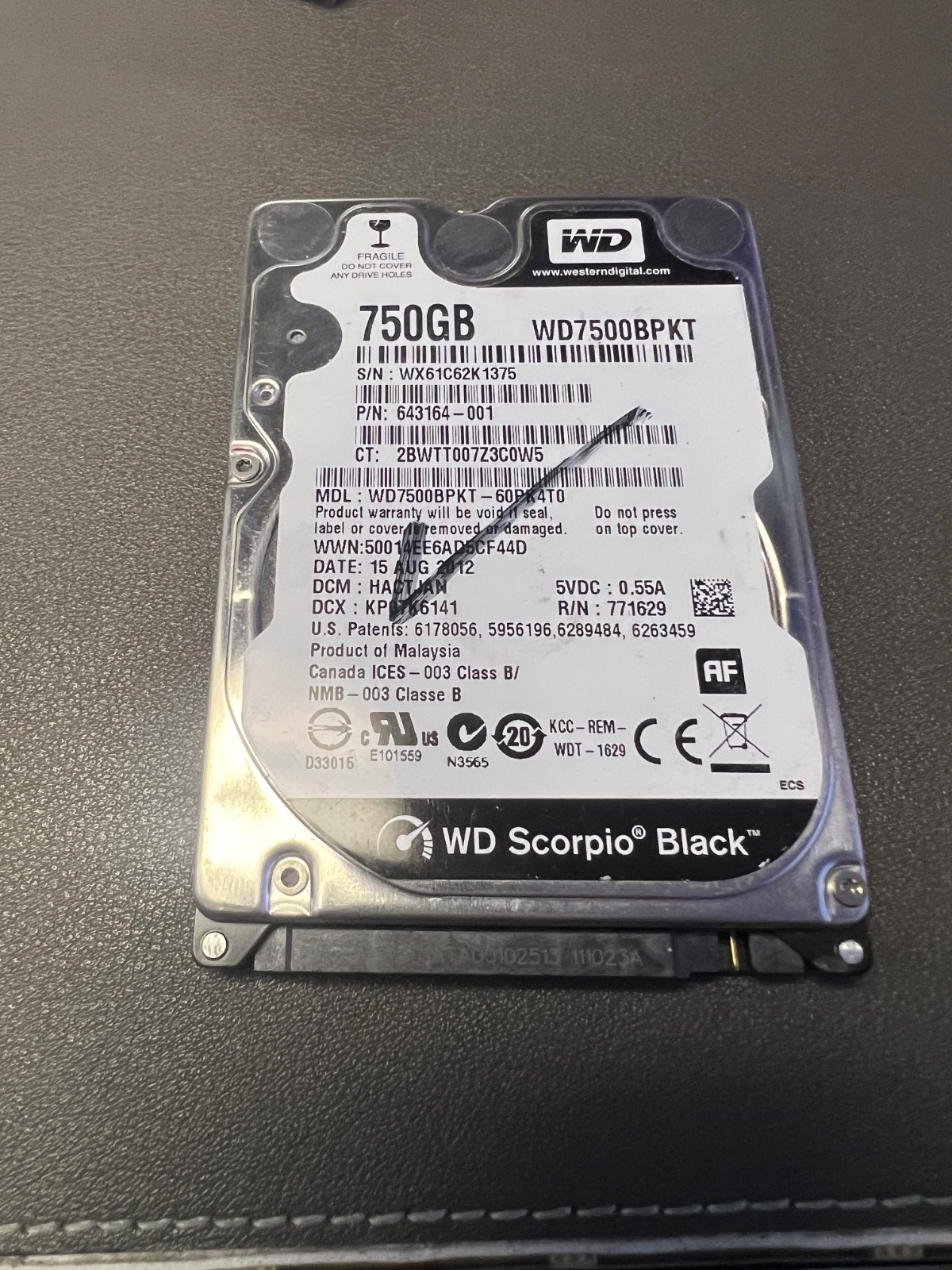 Western Digital 750GB WD7500BPKT-60PK4T0 DCM: HHCTJAN SATA 2.5" HDD Hard Drive