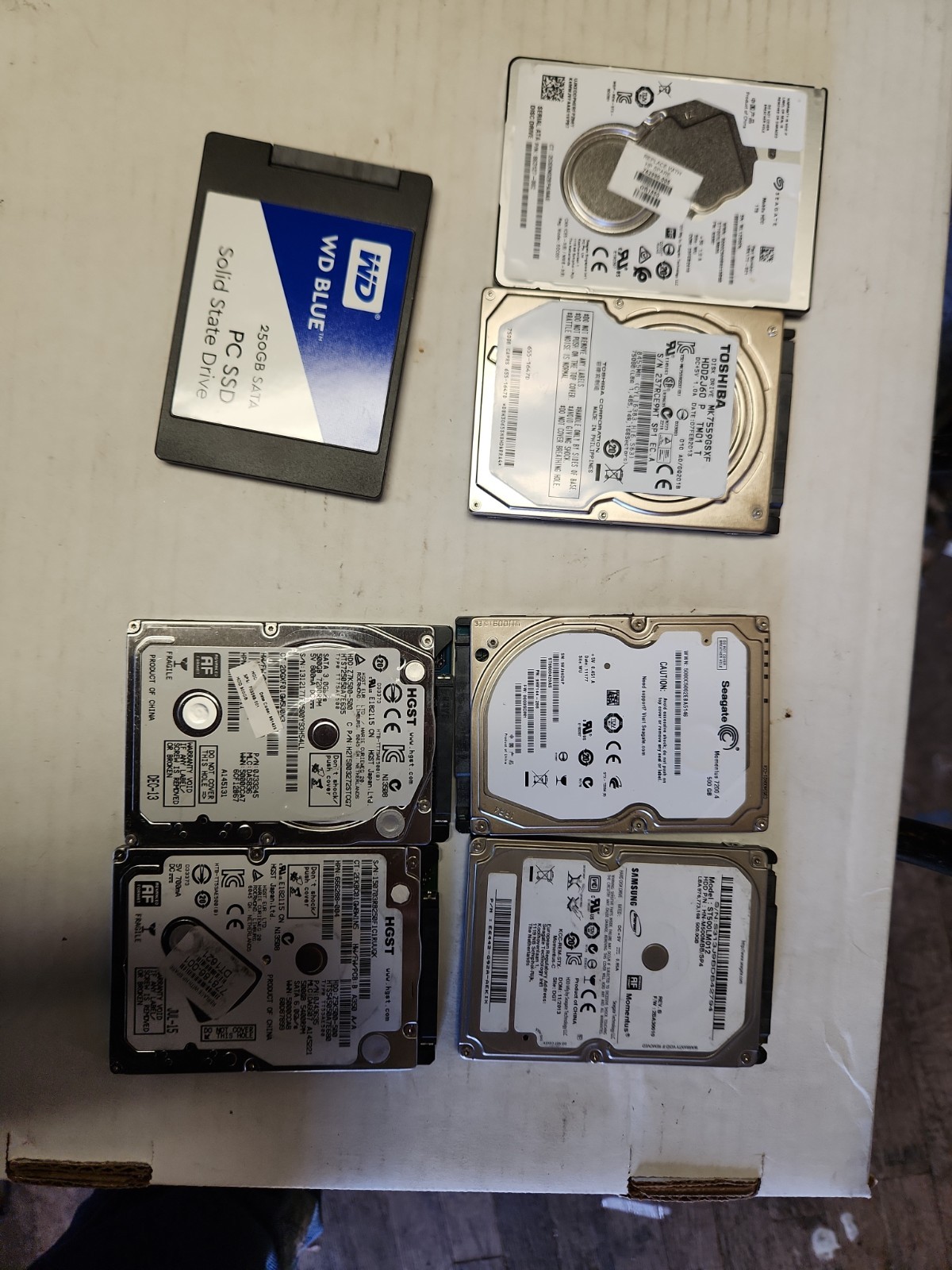 7 Laptop Hardrives  Parts. 1-SSD, 1-1TB, 4-500GB, 1-750GB