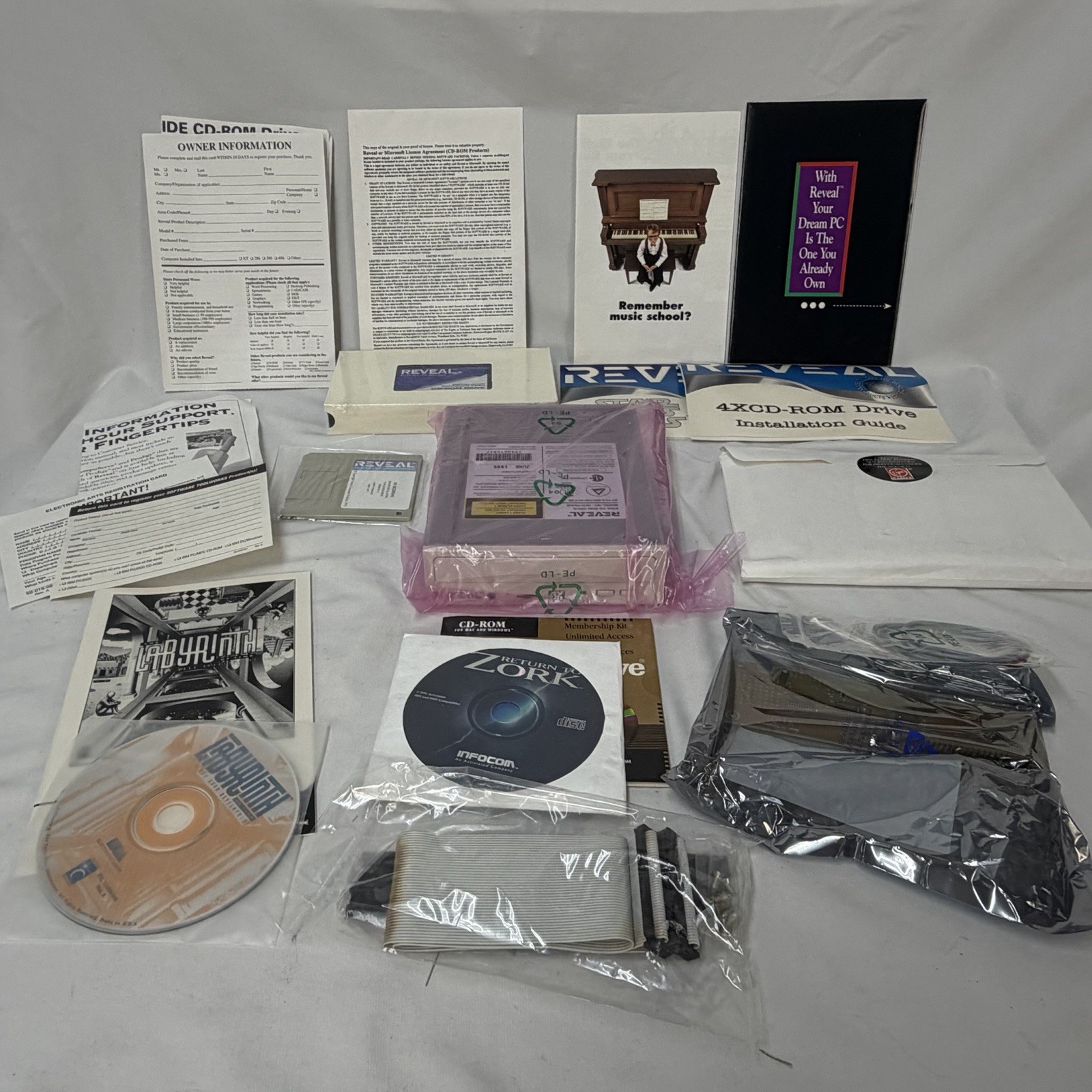 OPEN BOX REVEAL CDQ200 4X CD ROM DRIVE COMPLETE MANUALS SOFTWARE GAMES CABLES