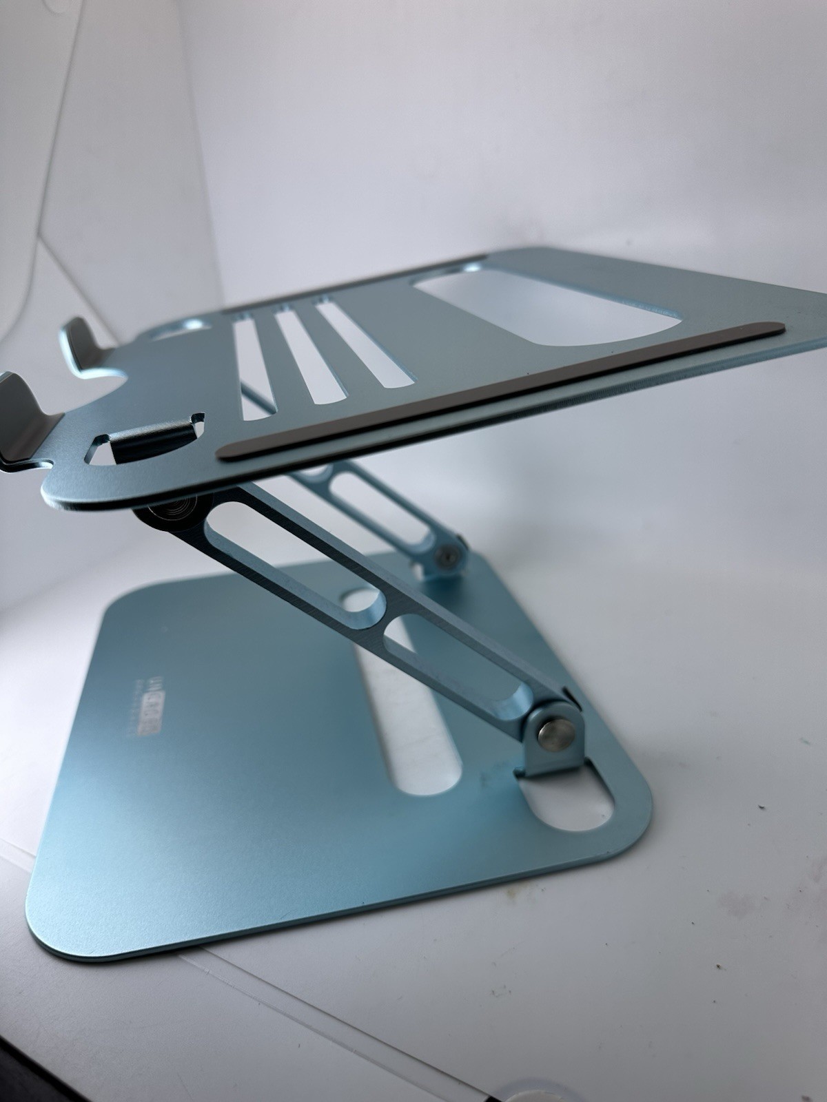 Uncaged Ergonomics Adjustable Laptop Stand Ocean Blue Foldable Computer Riser