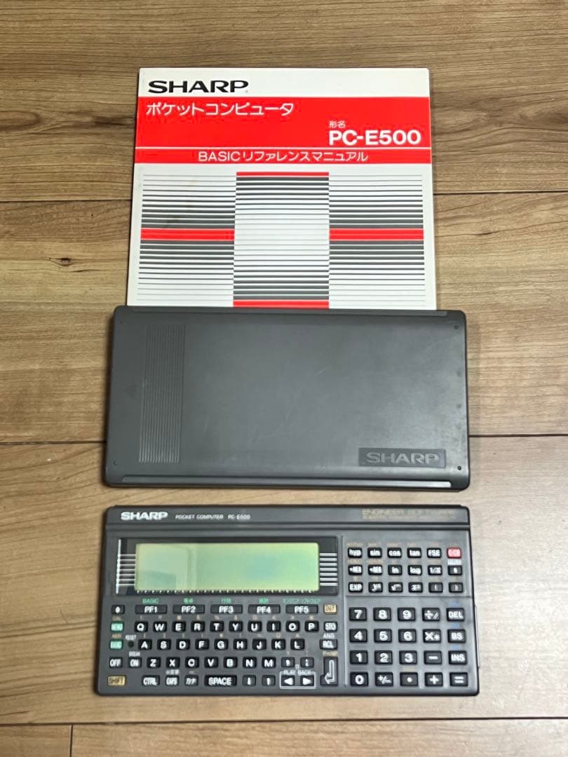 SHARP PC-E500 Pocket Computer BASIC Tested Working Cover Reference Manual Japan
