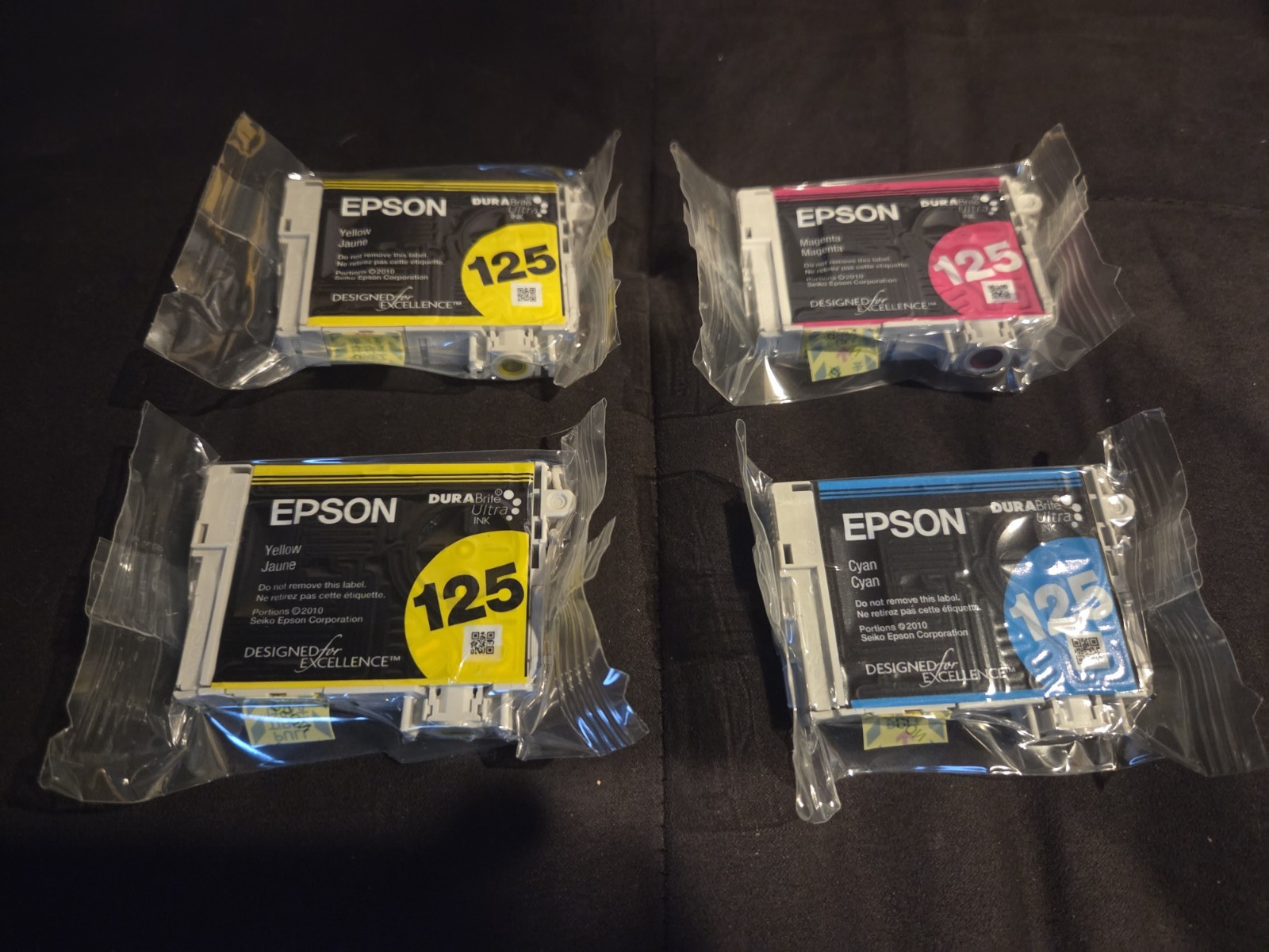 4 Genuine Epson 125 Ink cartridges 1x Cyan, 1x Magenta, 2x Yellow Sealed