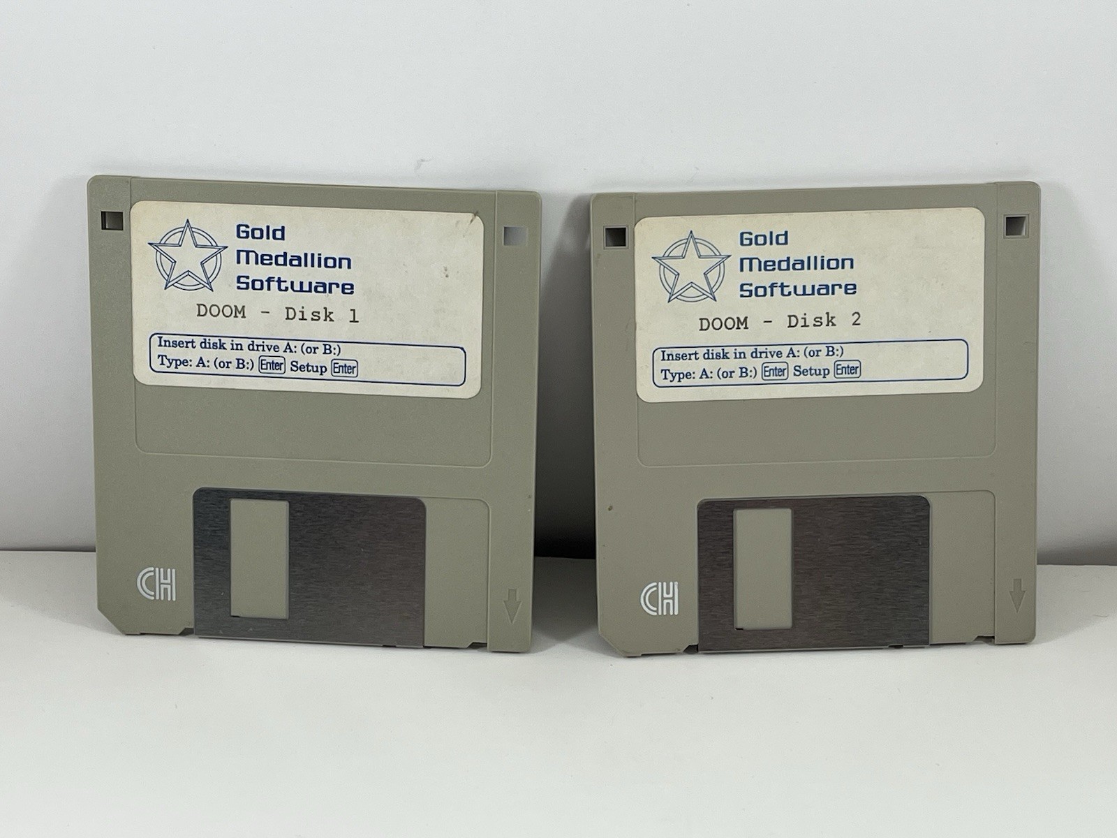 Gold Medallion Software - DOOM - 3.5" PC Floppy Disk 1 & 2 (Untested) Grey