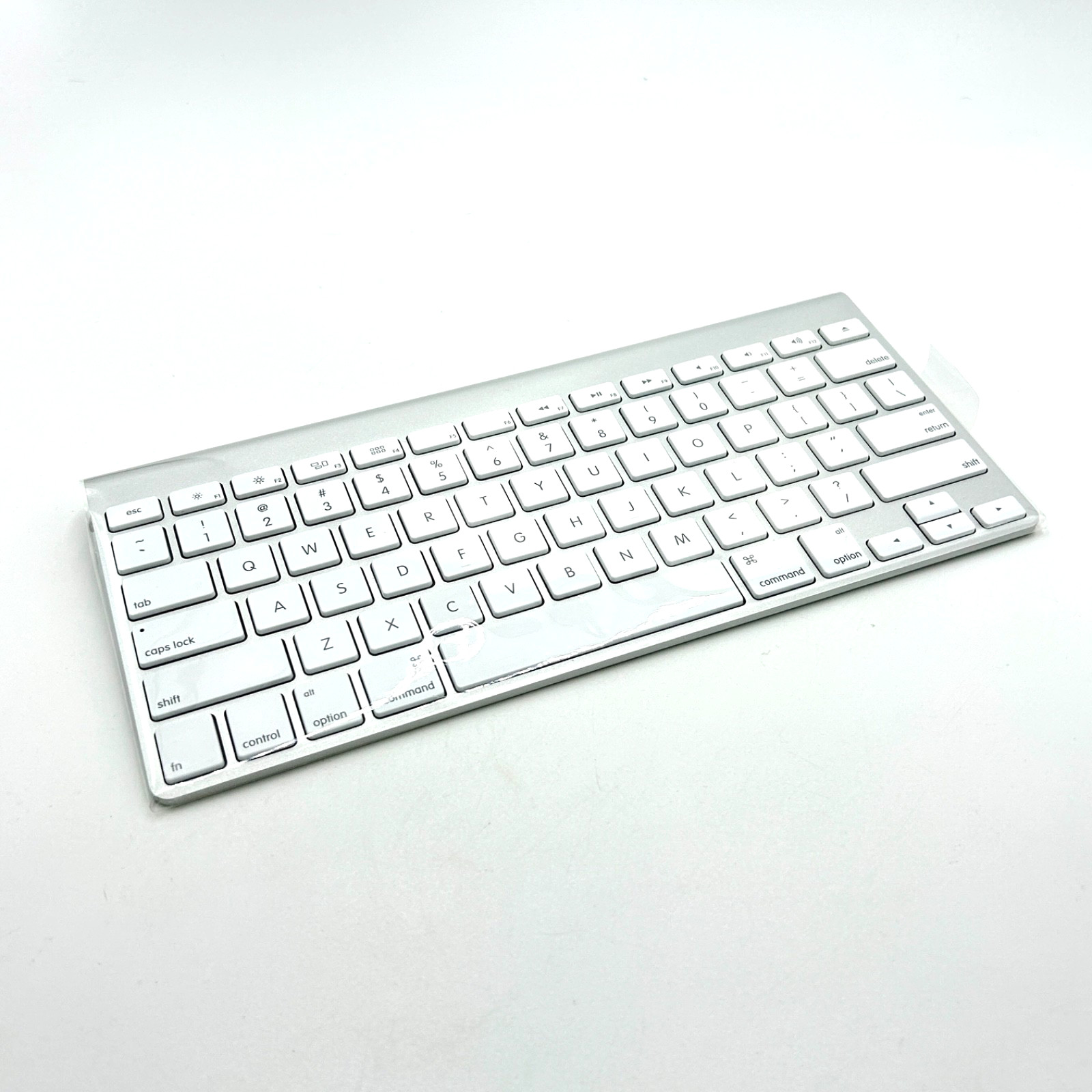 New in Original Plastic Sleeve Apple Silver Wireless Keyboard Model A1314 