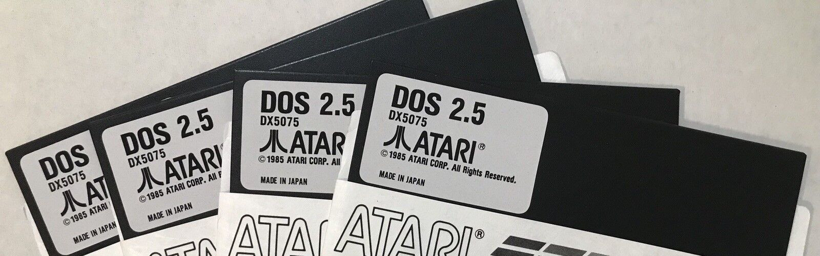 Atari DX5075 DOS 2.5  4 each 5 1/4 disks 800/XL/XE with generic sleeve