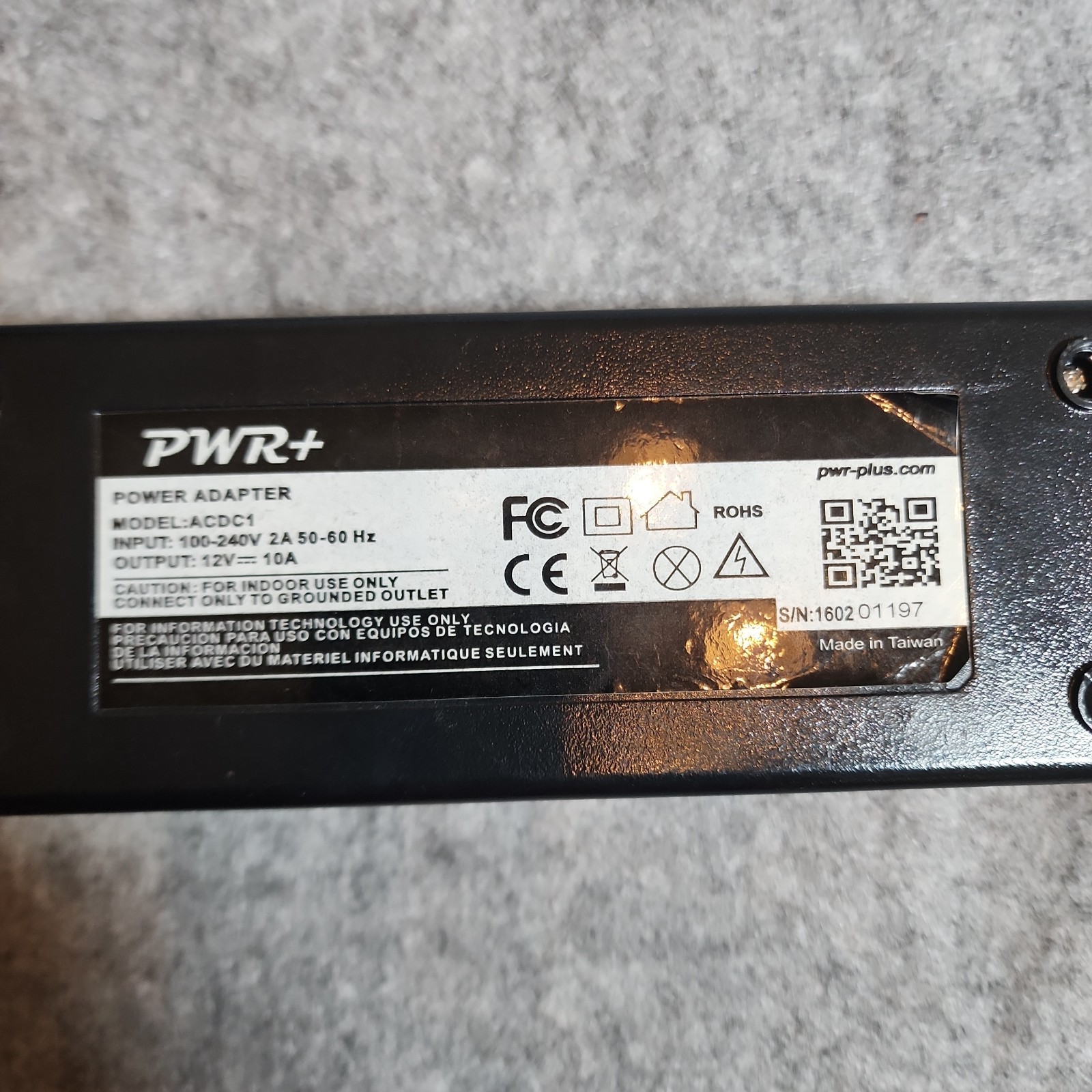PWR+ Power Adapter. Model:ACDC1 .100-240V,2A,50-60Hz.Output12V=10A