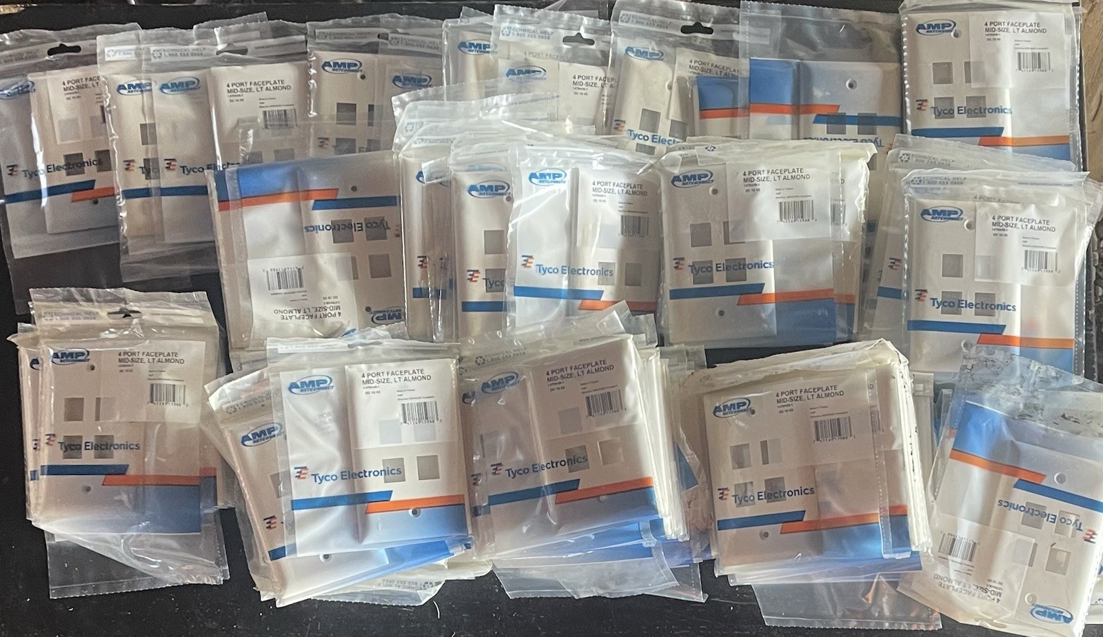 150- NEW 4 PORT Tyco   AMP NETCONNECT Faceplates, Almond, part no - 1479446-1
