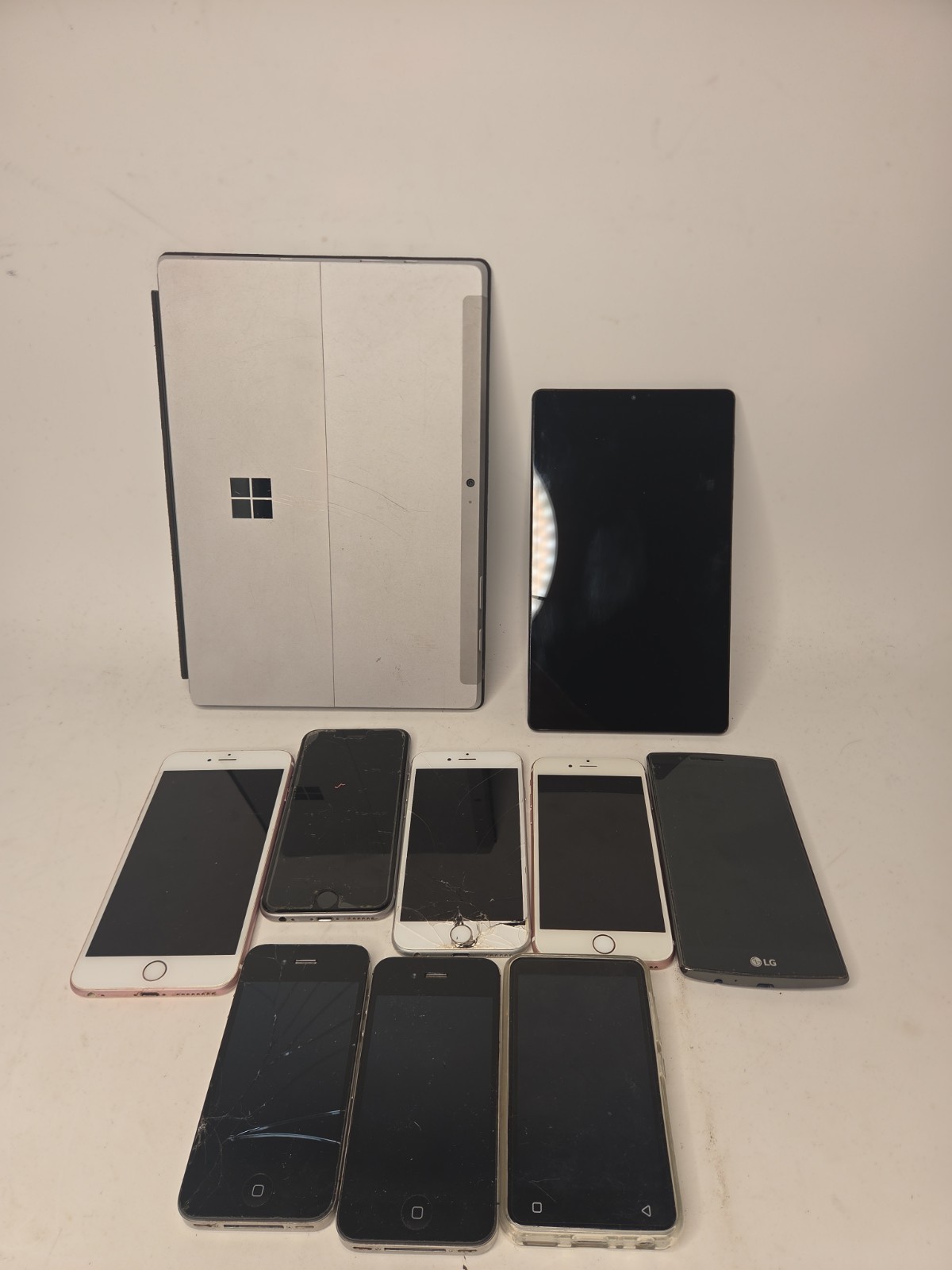 Electronics Lot For Parts Repair 6 iPhones Microsoft Surface Android Tablet