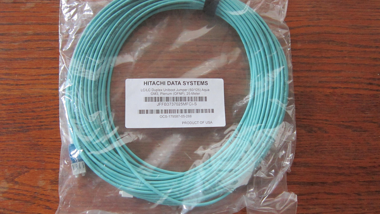 Hitachi LC LC Duplex Uniboot jumper 50/125 Aqua OM3 Plenum OFNP 25 M PN 60472-2