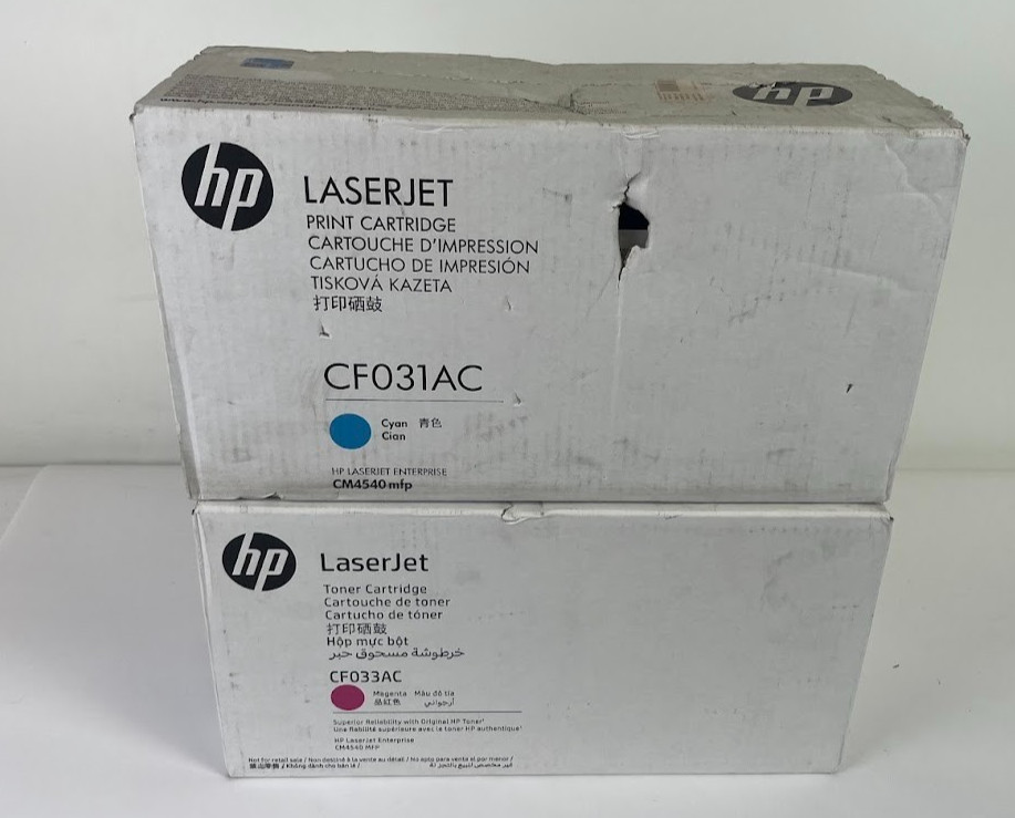 HP CF031AC Cyan CF033AC Magenta Toner Cartridges CM4540 New Damaged Box