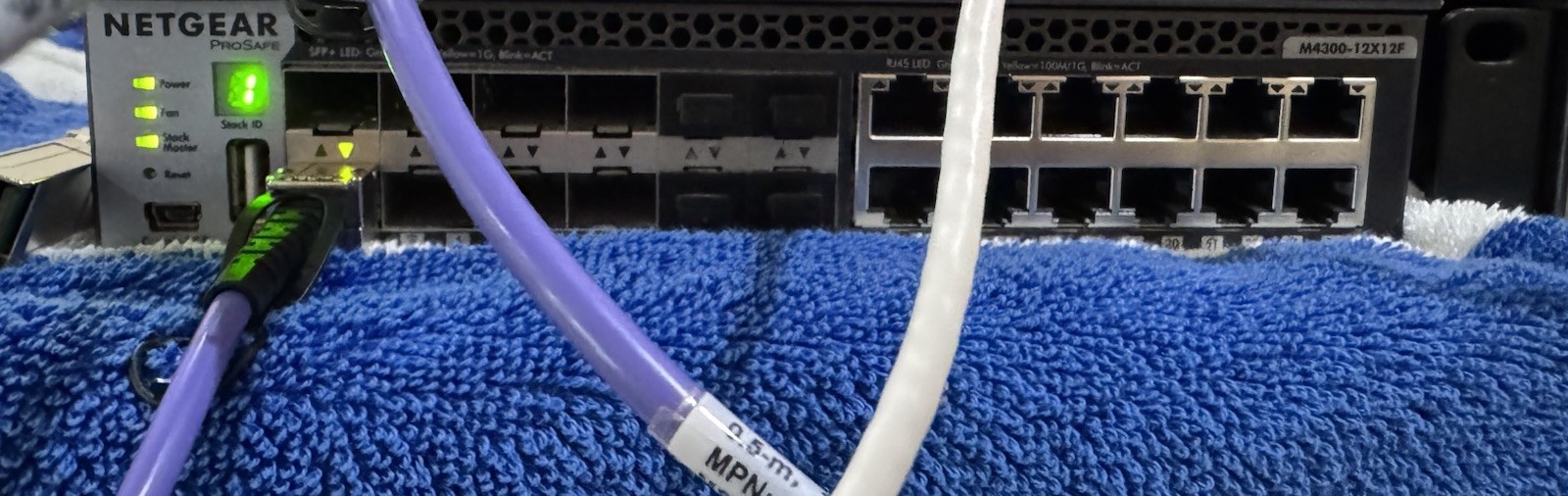 NETGEAR ProSAFE M4300-12X12F 24-Port 10GbE L3 Managed RJ-45/SFP+ Switch 1BA5