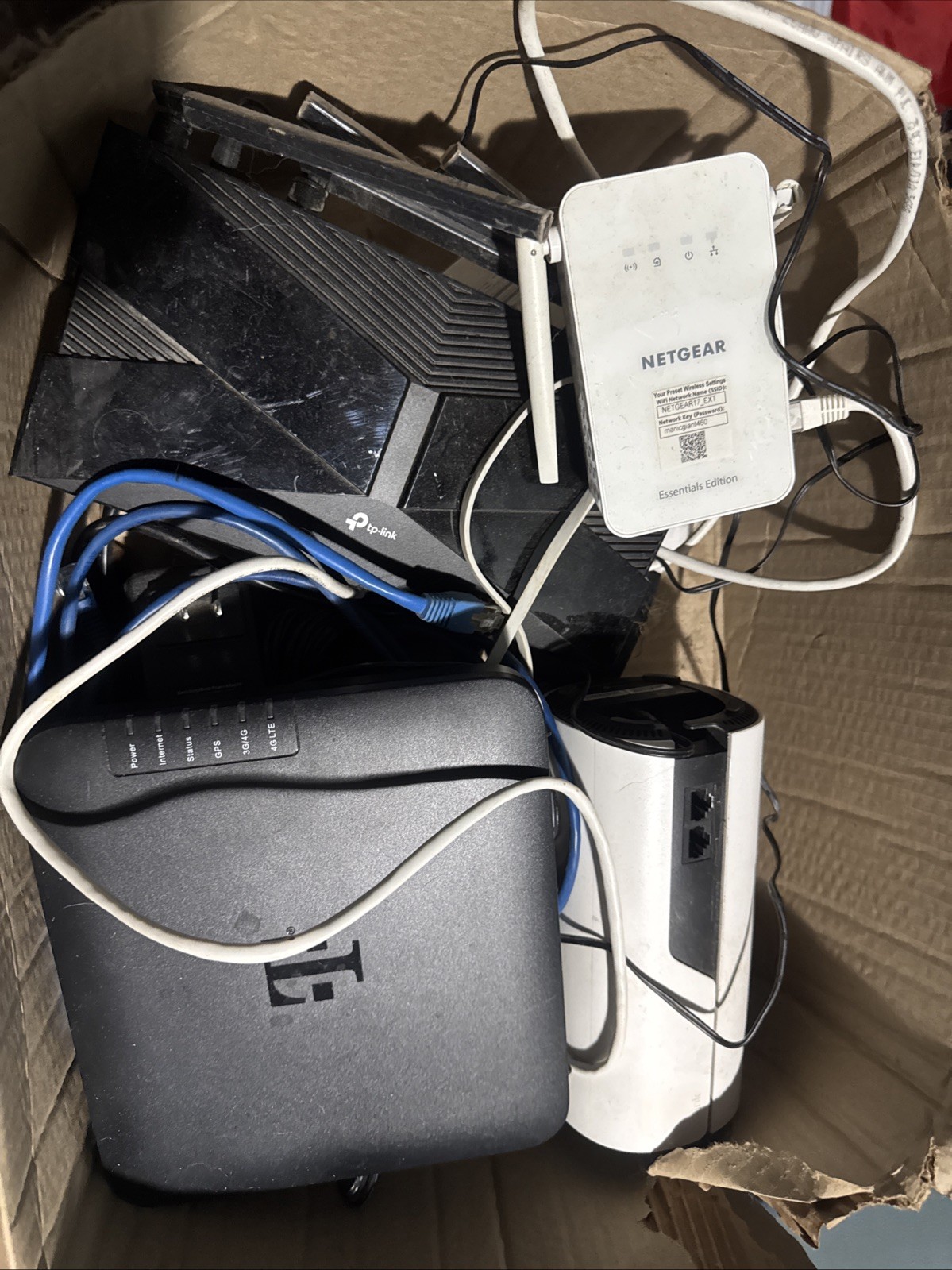 Box of 4 Routers, Worked When Last Used Before Stored But Currently Untested