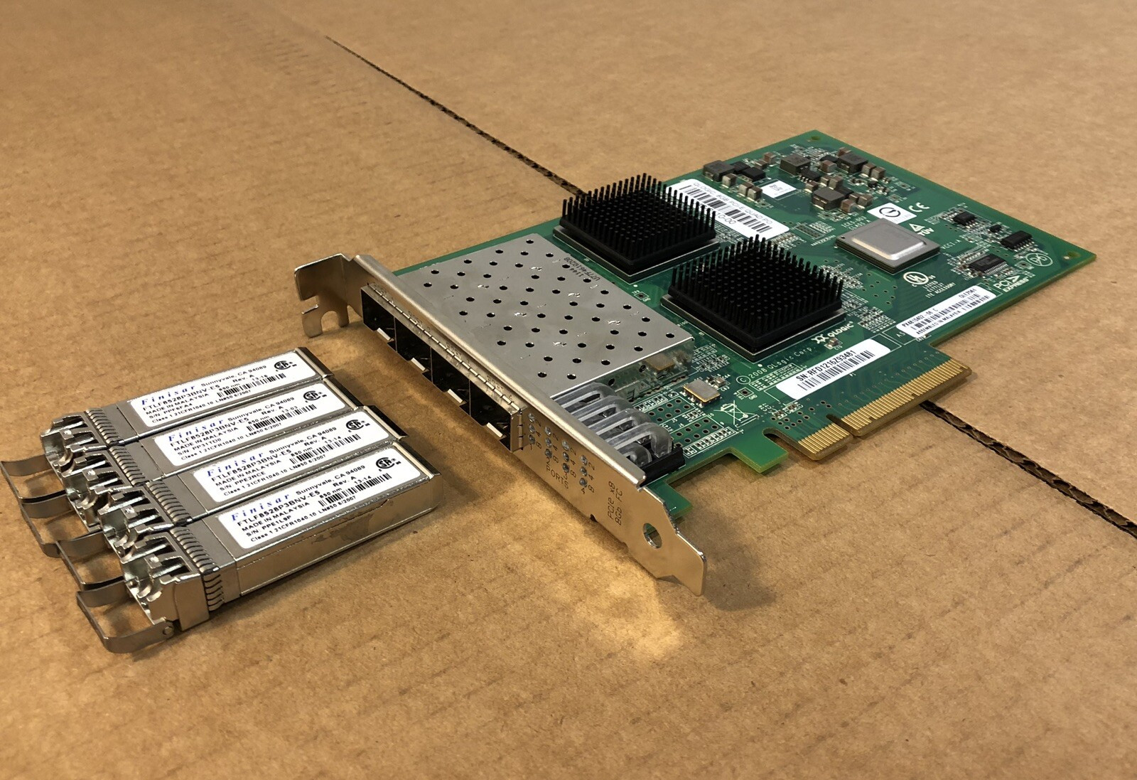 QLogic QLE2564 Quad Port PCI-E FC HBA 4 Port w/4x 8Gb Fiber Channel Transceivers