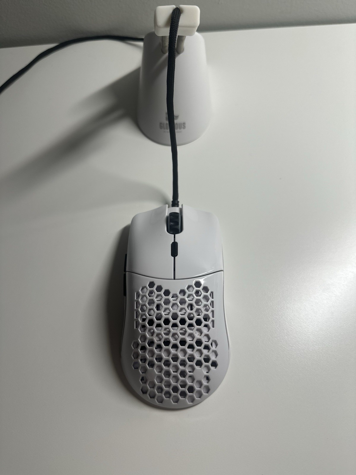 Glorious PC Gaming Race Glossy White Wired Mouse. With mouse stand cable holder.