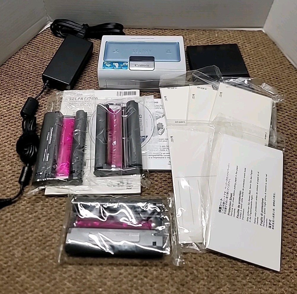Canon Selphy Compact Photo Printer CP400 With Ink And Postcard Size Sheets