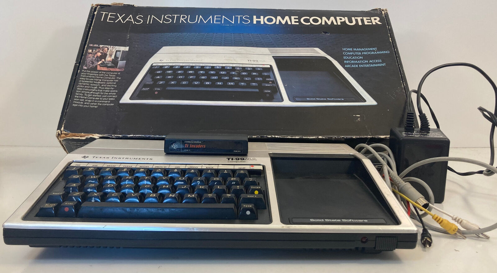 Texas Instruments TI-99/4A Home Computer With Box, WIres, and Game Silver