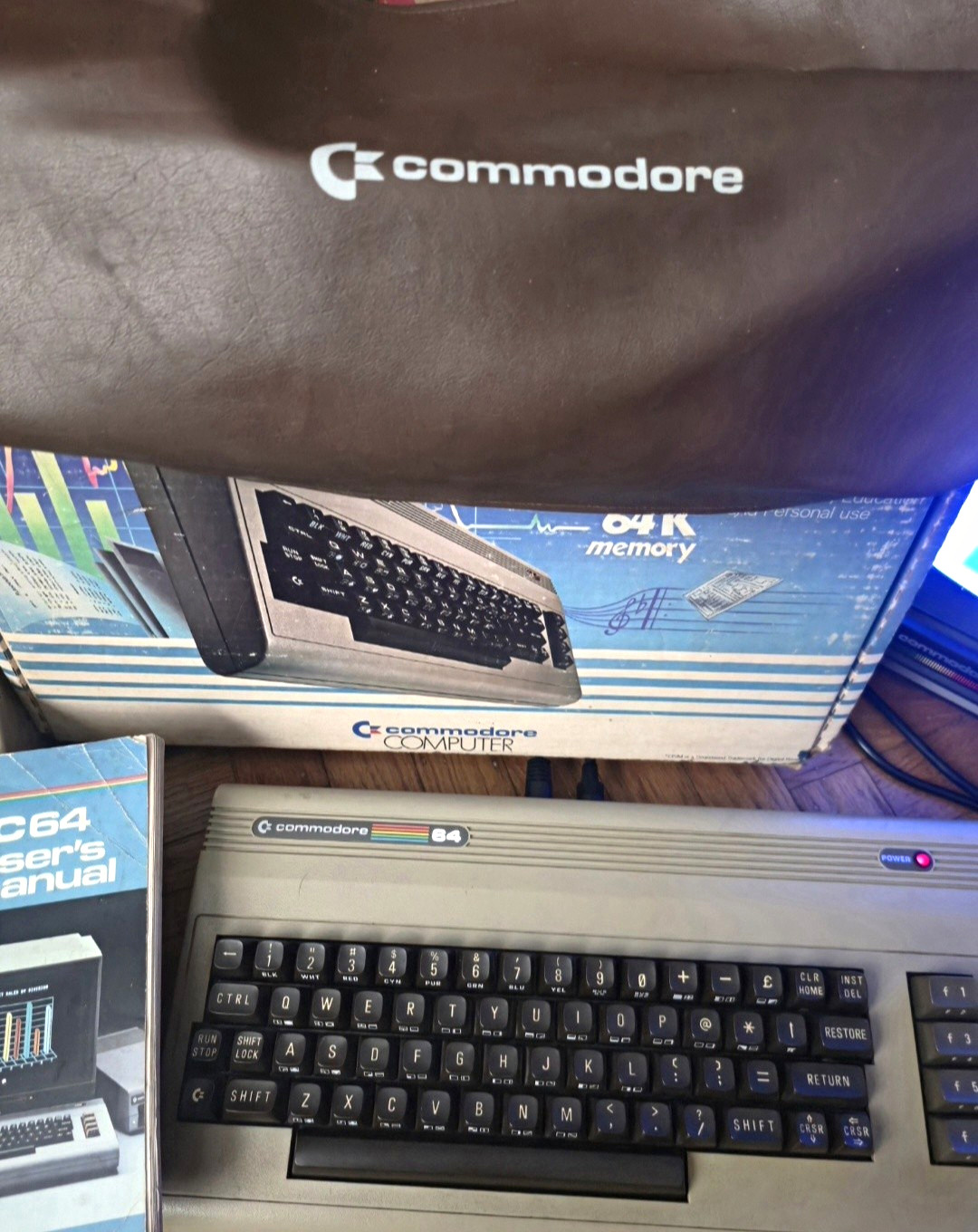 Commodore 64  Computer With Original Box, Manual, Vinyl Cover And 20 Loose Games