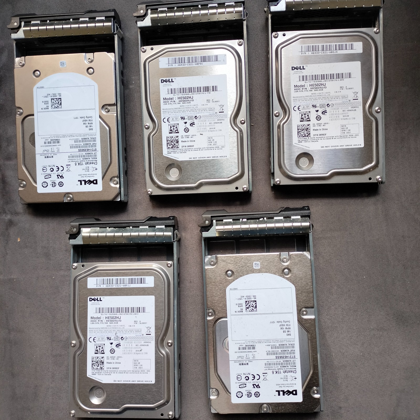 From Dell T410 Srvr 5 Genuines HDD: 2 146Gb 15k SAS and 3 500Gb 7.2k SATA +Tray
