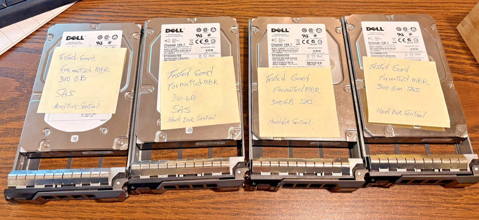 [LOT OF 4] Dell Cheetah 300GB 6Gbps 15K.7 3.5" SAS ST3300657SS HDD w/Caddies