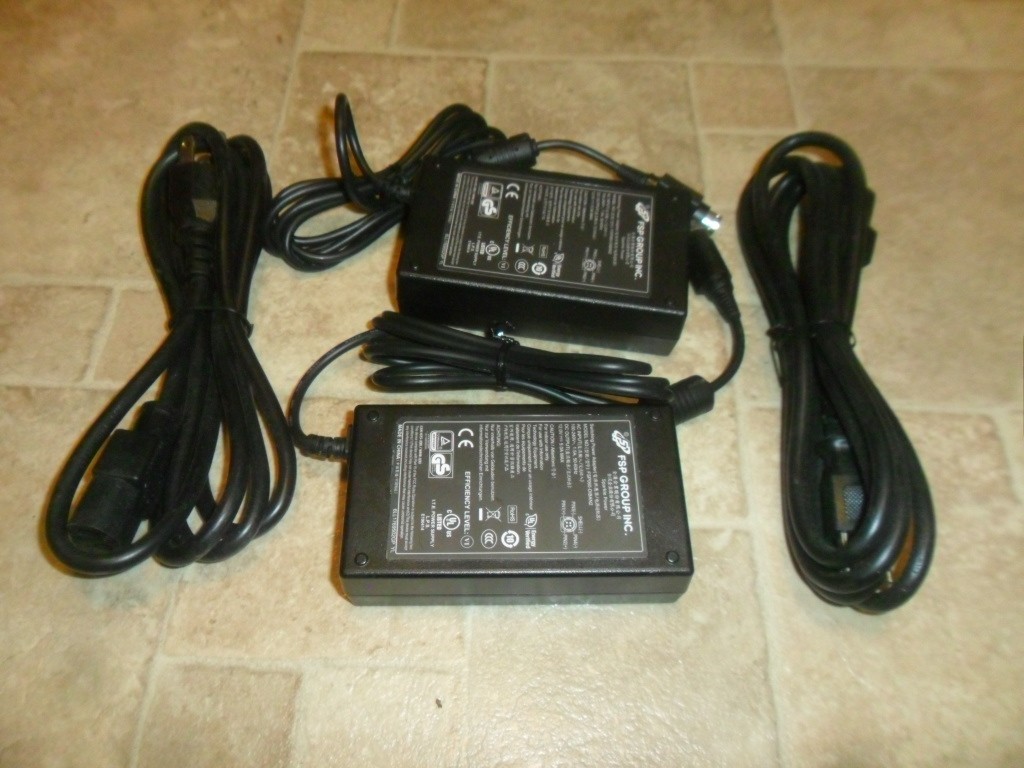 Pair of New FPS Group 12V power supplies with 4 pin round plug